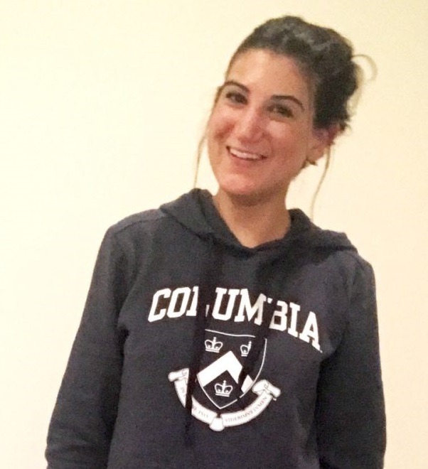 Female wearing a 'Columbia' sweatshirt