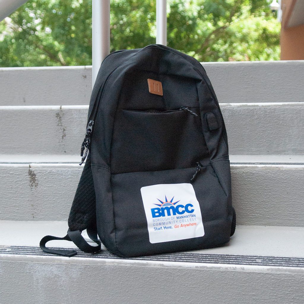 BMCC backpack sitting on concrete stairs